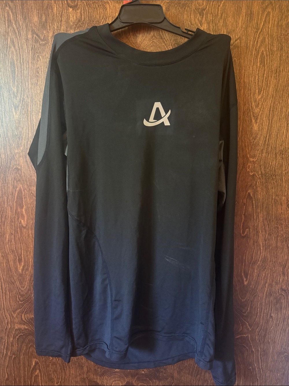 Amazon Men's Black Long Sleeve Athletic Top with Reflective Logo